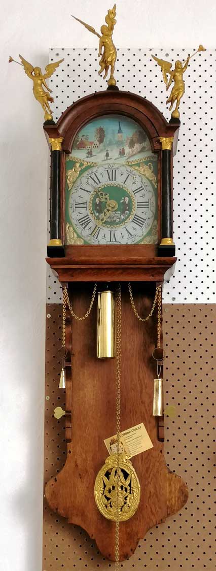 Frriesian Longtail Clock